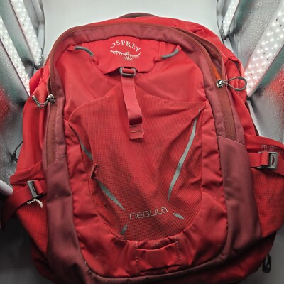 Osprey Nebula 24/7 Exterior Is Worn & Has A Tear Interior Appears Excellent 