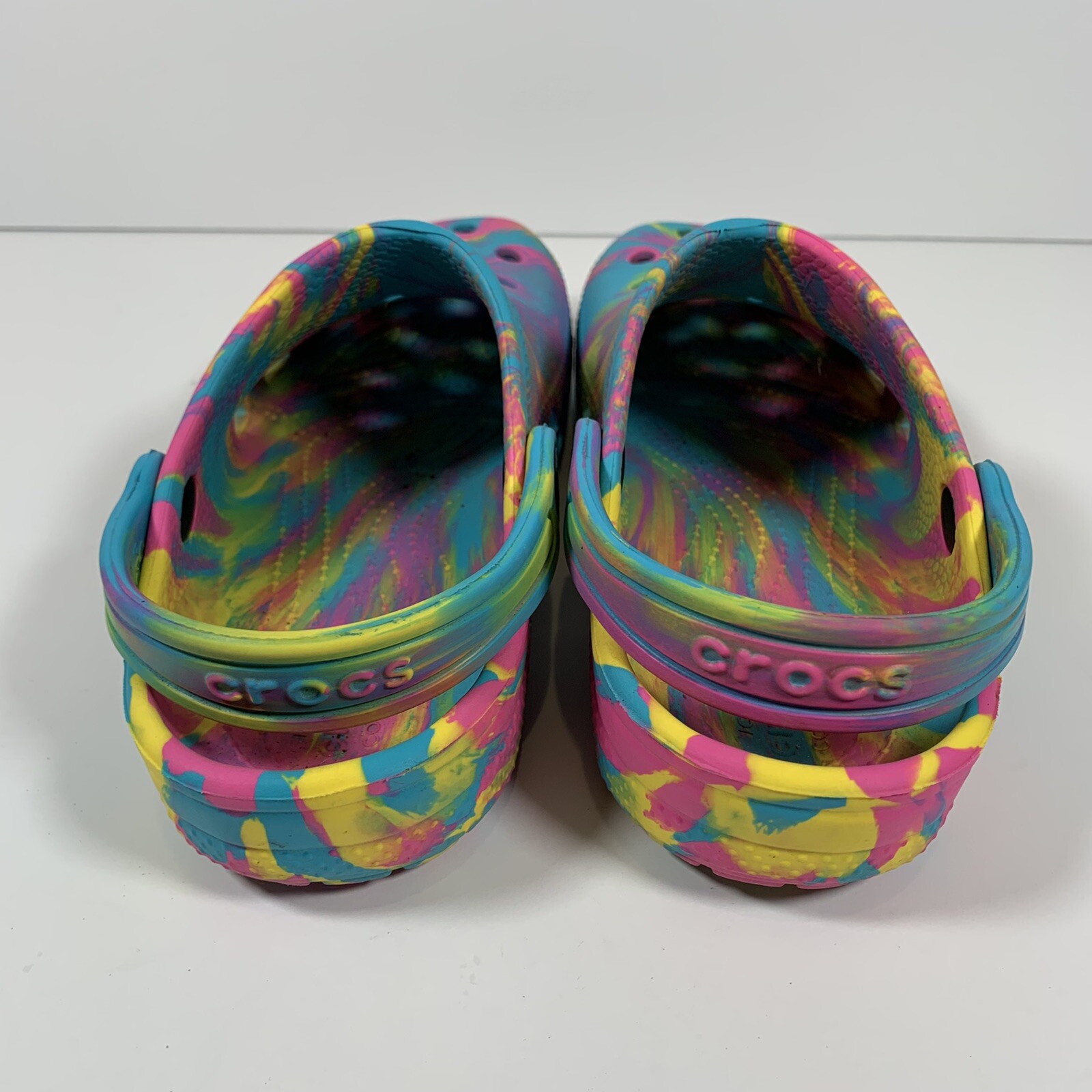 pink yellow blue crocs