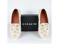 coach moccasin flats