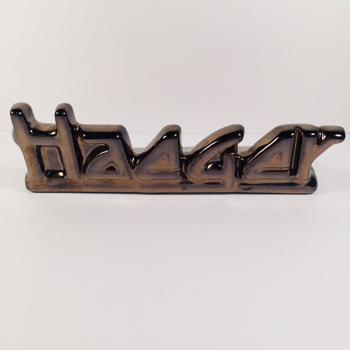 Haeger Pottery Embossed Store Dealer Sign Metallic Bronze Gloss Glaze 8” wide
