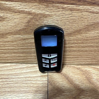 DSC WT4989 4 Button Wireless Backlit Security Key Fob With Icon Display