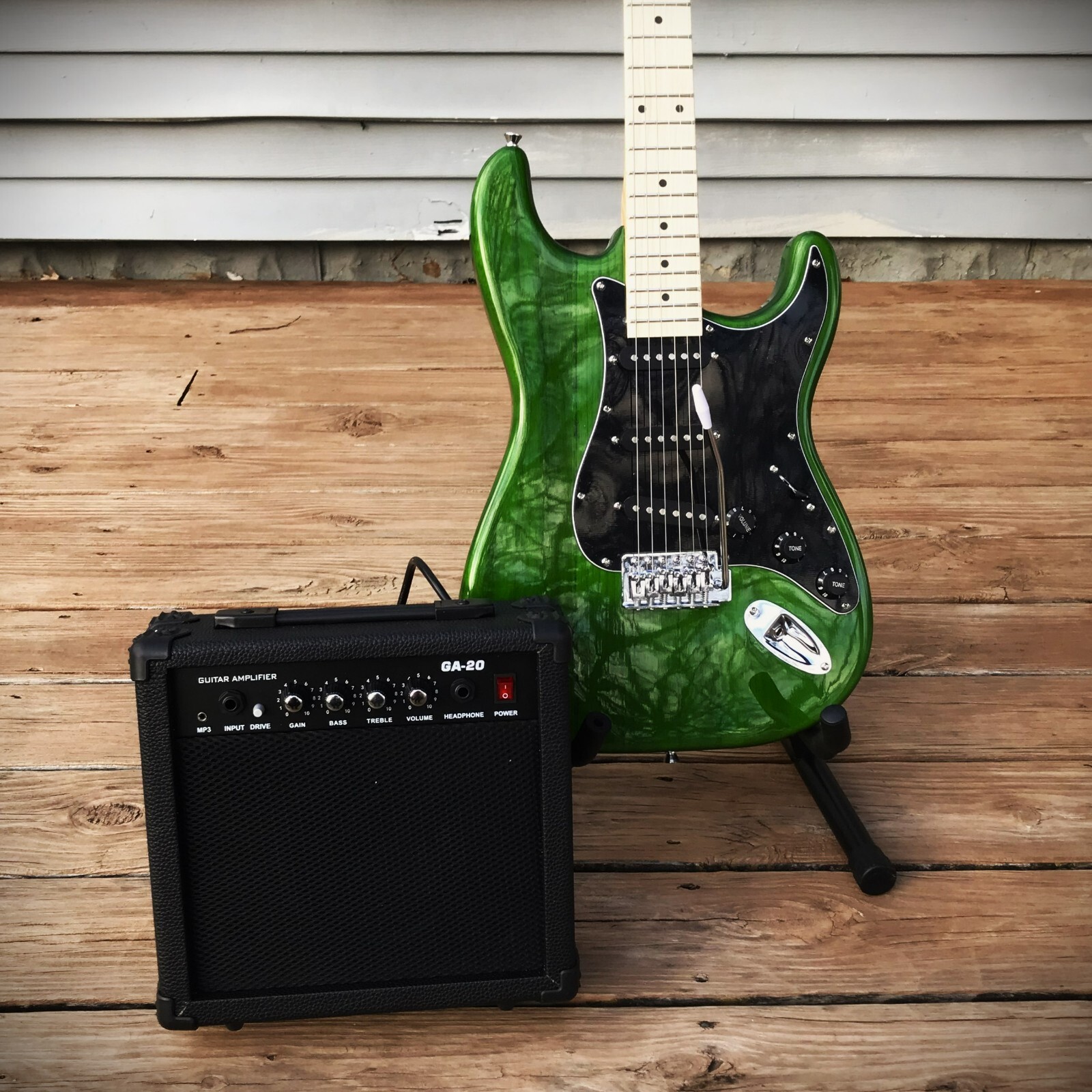Full-Size Green Electric Guitar Starter Package with 20-Watt Amp and Accessories