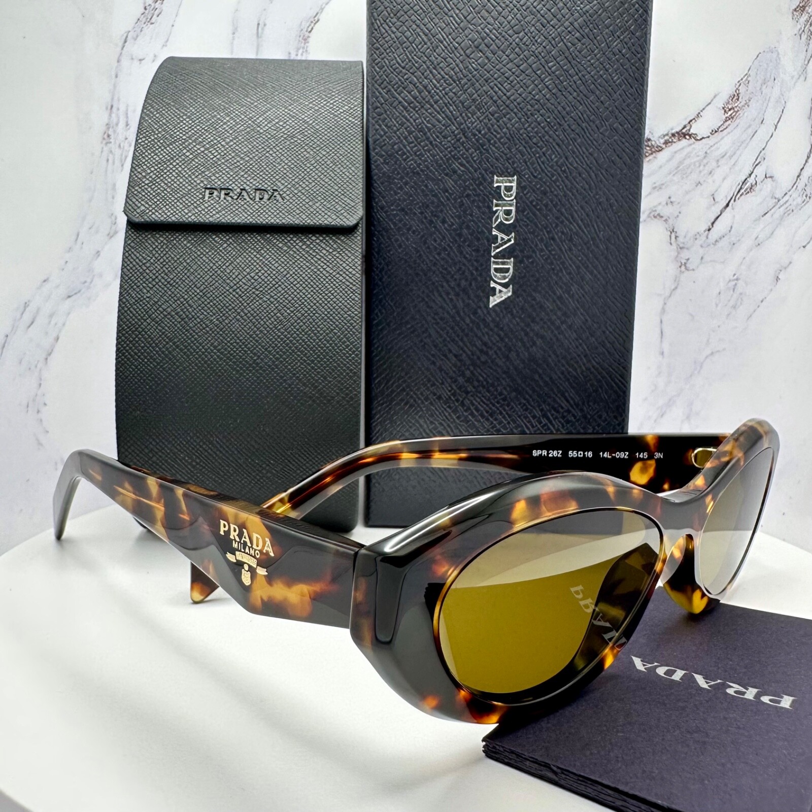 PRADA ブラウンキャットアイサングラス PRADA New Sunglasses Symbole Logo Brown Tortoise Cat Eye 55