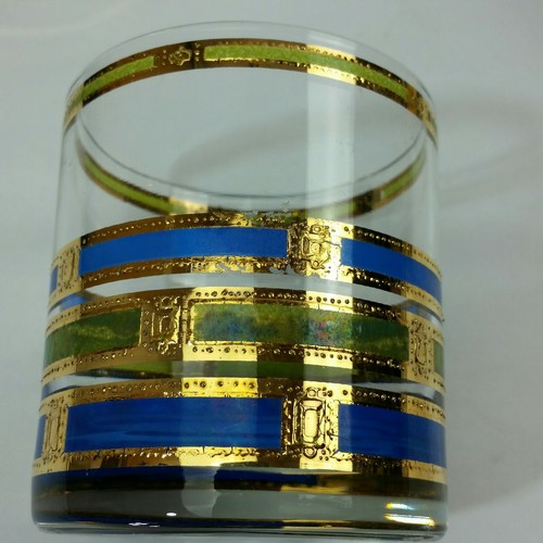 4 VINTAGE MID CENTURY BARWARE  gold blue and green colors