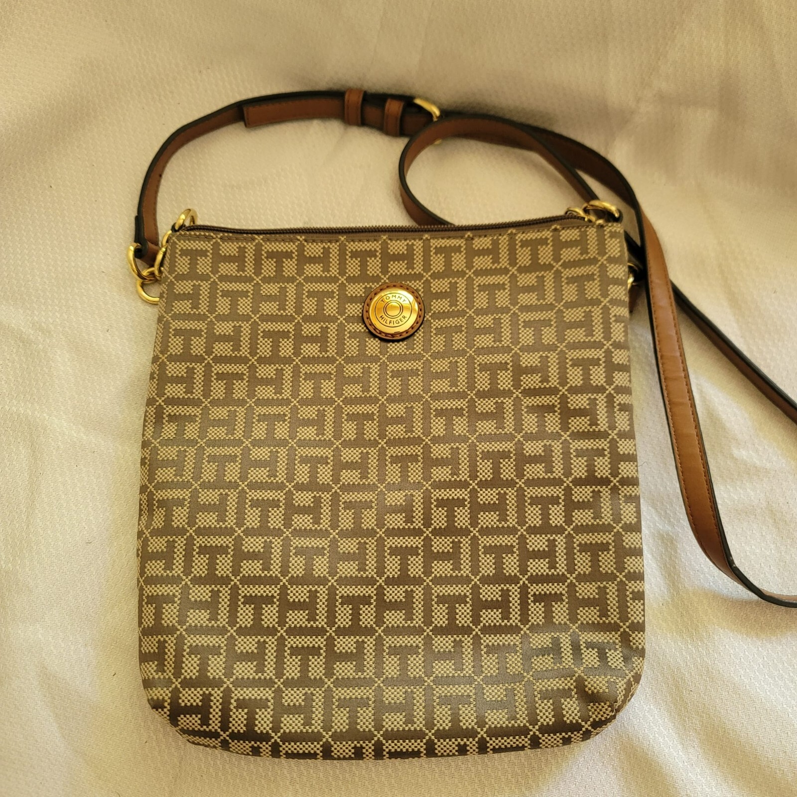 Tommy Hilfiger Beige Brown Trim Zipper Cossbody bag,strap has adjustable buckle