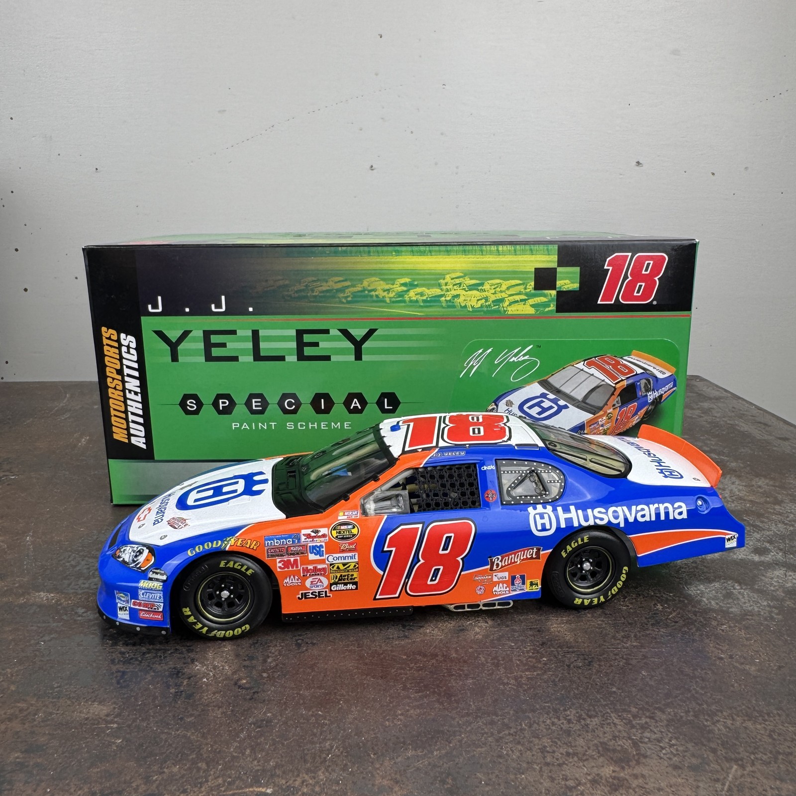 2006 J.J. Yeley #18 Husqvarna 1:24 NASCAR Diecast Monte Carlo