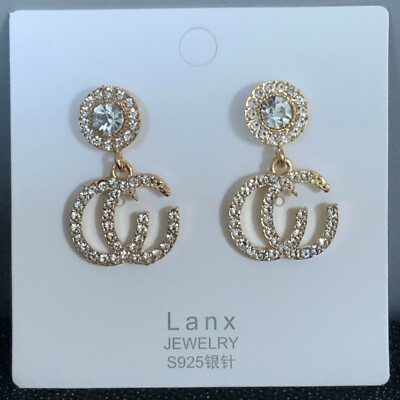 Boucles d'oreille Strass blanc S925 fermoir clou