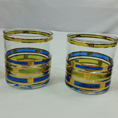 4 VINTAGE MID CENTURY BARWARE  gold blue and green colors