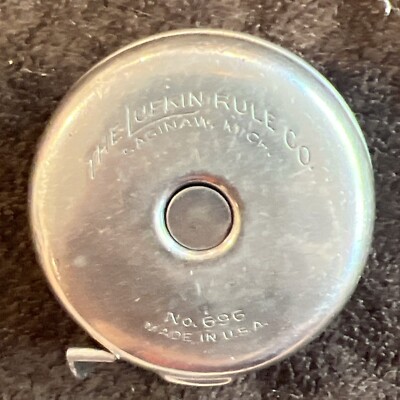 Antique LUFKIN RULE CO. ROUND 6  METAL TAPE MEASURE 696 Saginaw, Mich