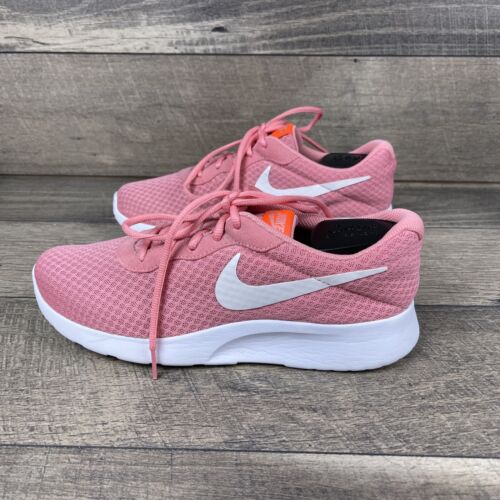 light pink nike tanjun