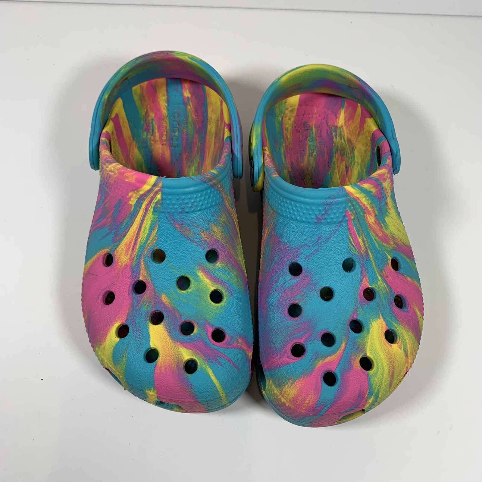 pink yellow blue crocs