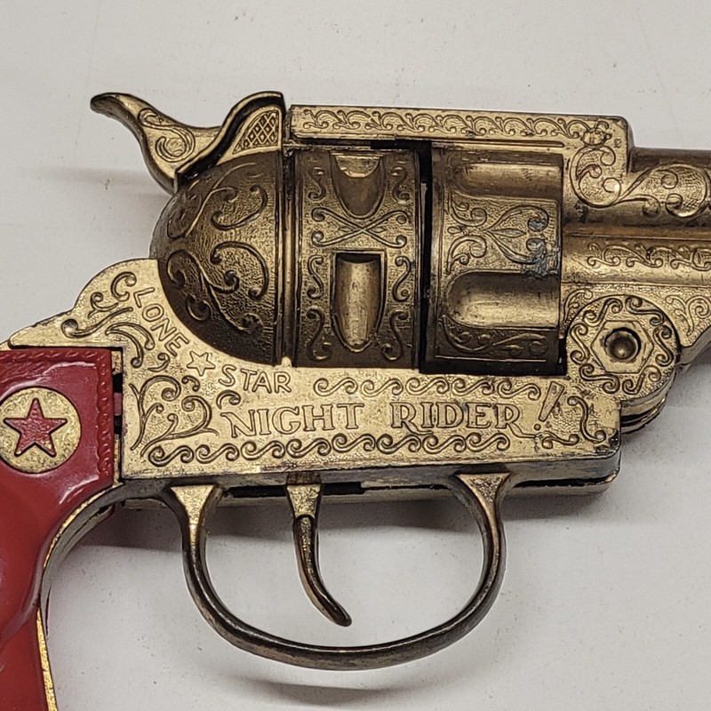 Very Rare Lone Star Night Rider Cap Gun In Gold With Red