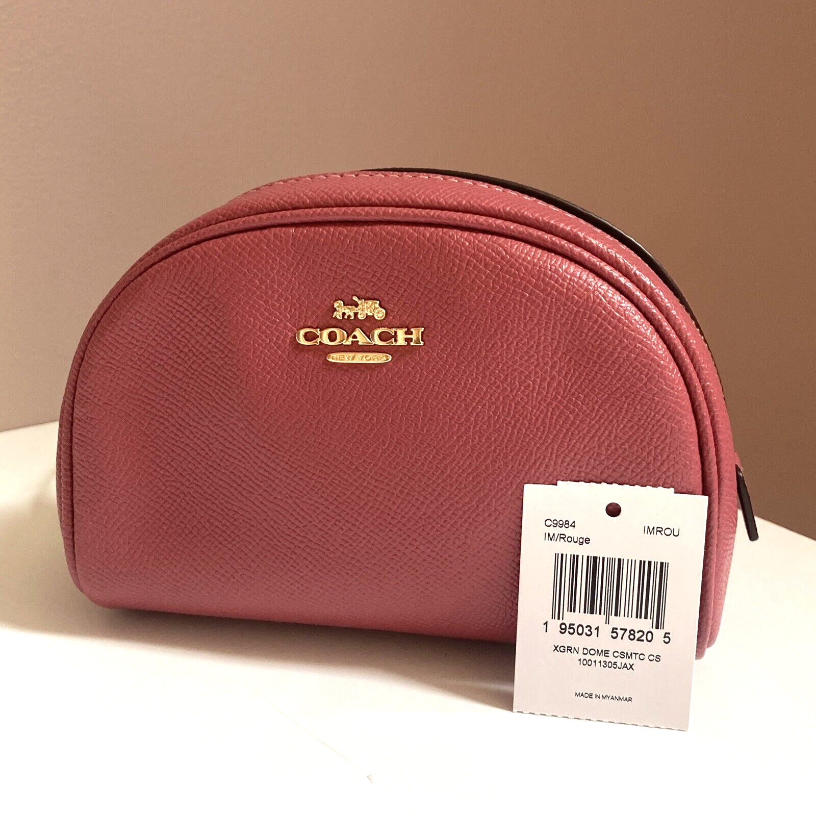 red coach makeup bag