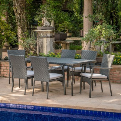 Lula Outdoor 7 Piece Wicker Rectangular Dining Set with Water Resistant Cushions