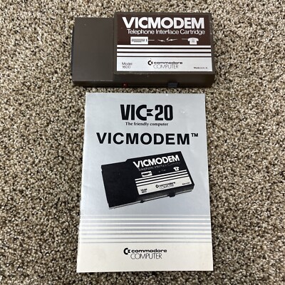 Vicmodem telephone interface cartridge Commodore  64 Model 1600 with manual
