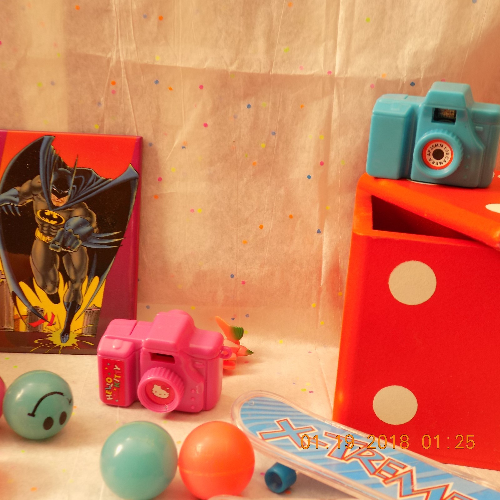 lot of mixed toys stress pig,hello kitty camera,happy face bounce balls,animal