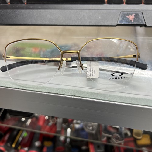 Oakley Moonglow OX3006-0653 Satin Antique Gold Unisex Oakley Moonglow OX3006-0653 Satin Antique Gold Unisex