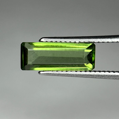 Olive Green Tourmaline Tapered Emerald Cut Faceted 76 cent, from Paprok mine