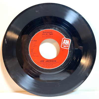 JOE JACKSON: RIGHT AND WRONG / BREAKING US IN TWO (1986) Vinyl 45 RPM Rock