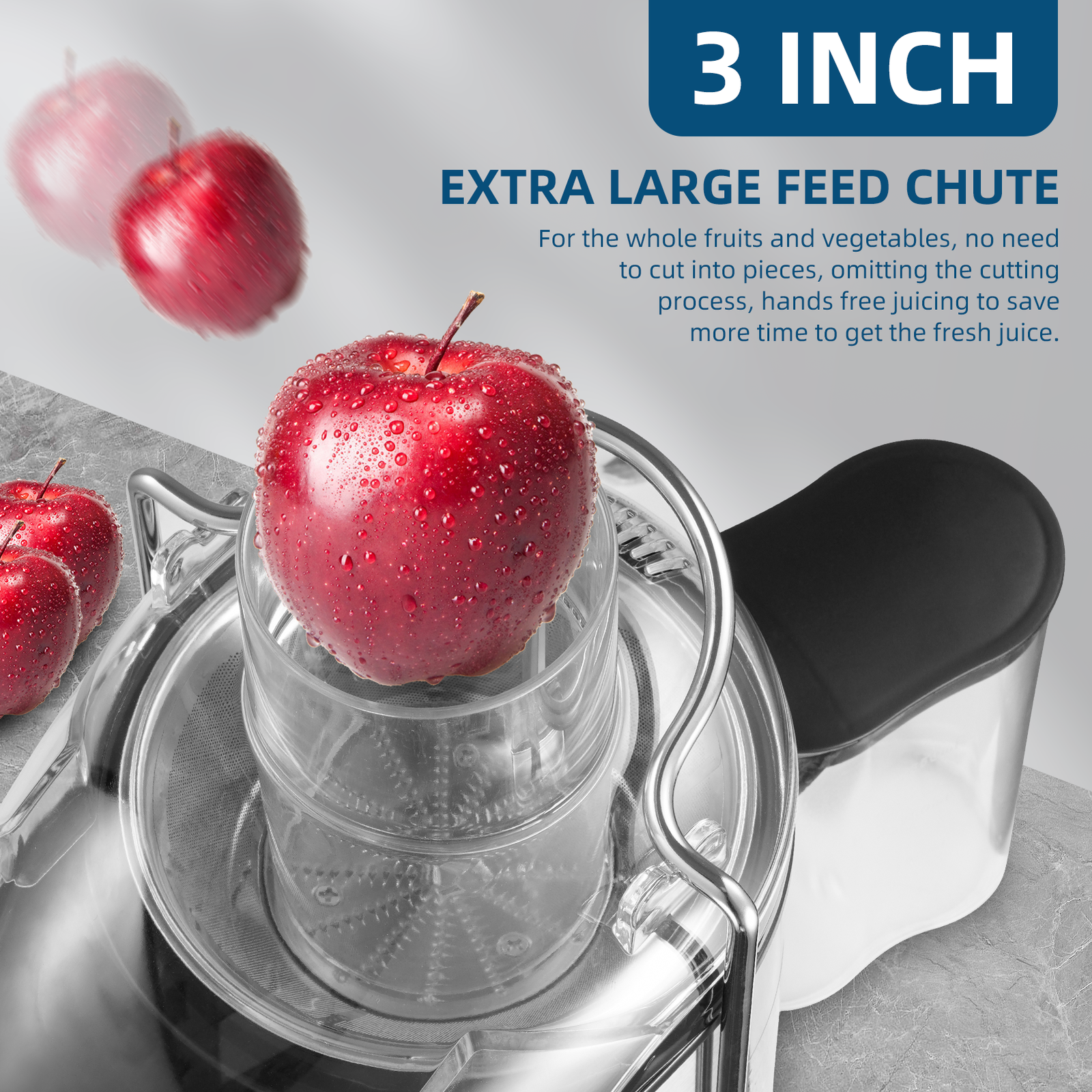 Whole apple being placed in the wide-mouth feed chute of the juicer