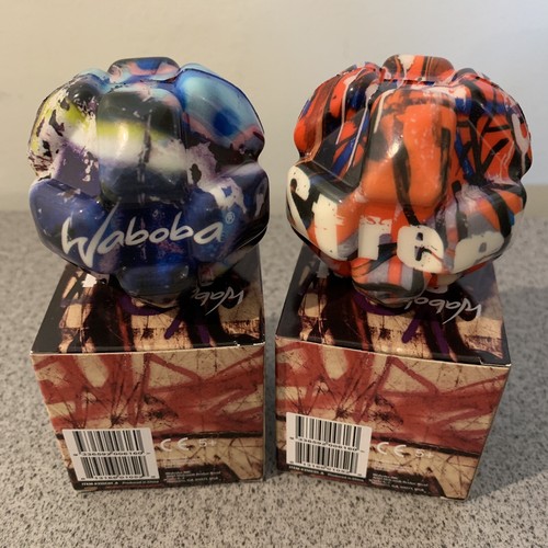 SET of 2 Waboba Street Ball Balls Bouncing Crazy Spinning Blue/Purple Orange NIB