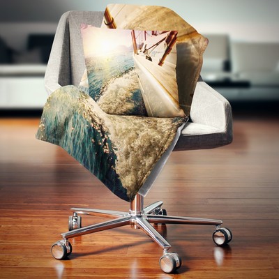 Designart 'Huge Yacht Sailing Against Sunset' Pier Throw Blue 71 in. x 59 in.
