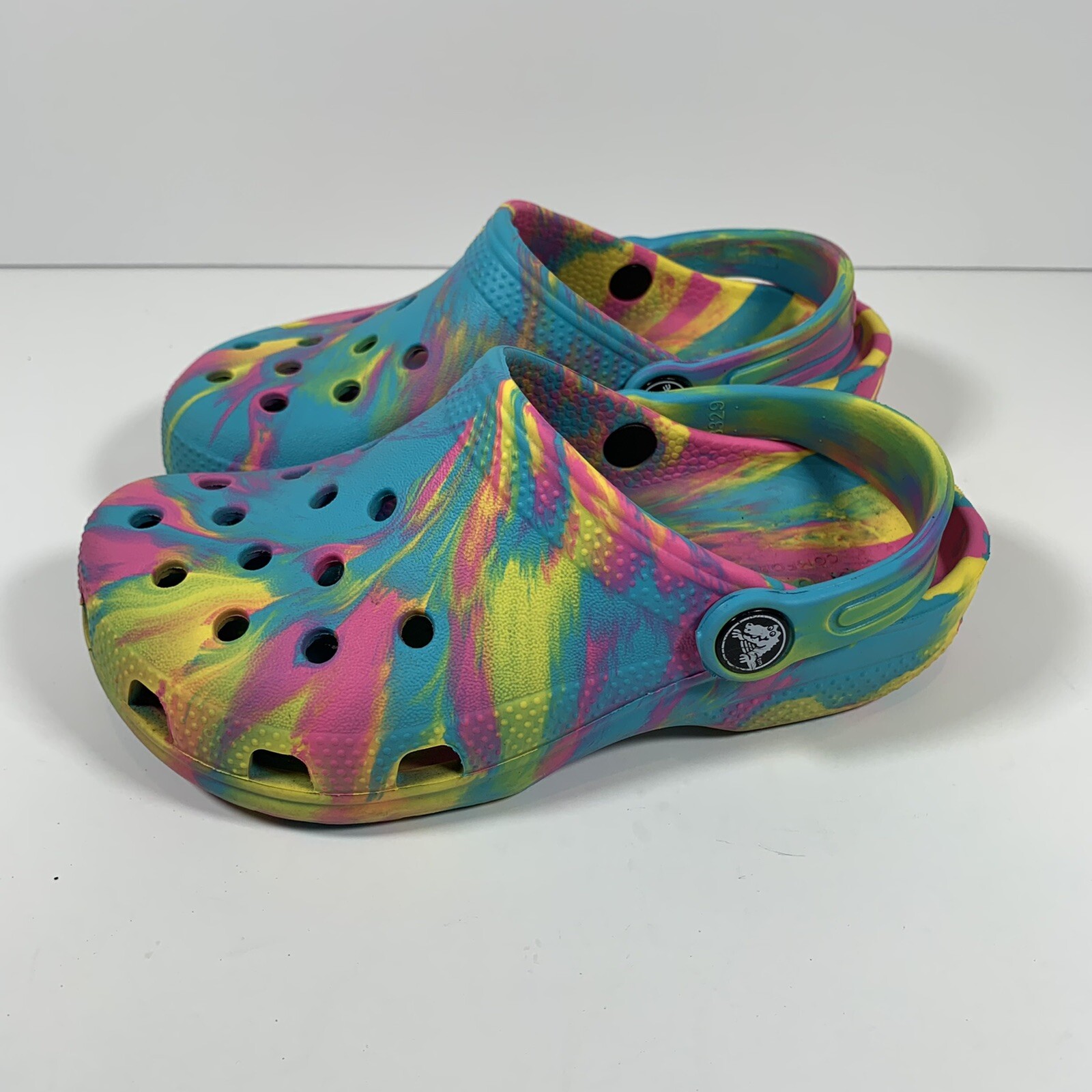 pink yellow blue crocs
