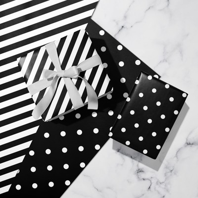 - Gift Wrap With Stripes And Polka Dot Design For Birthd...