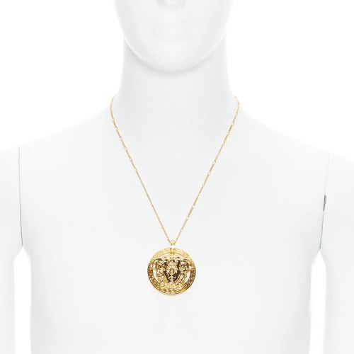 VERSACE Medusa Greca coin medallion gold tone nickel short