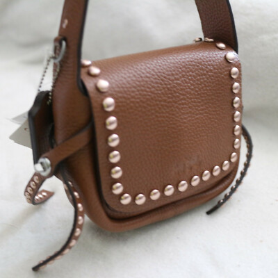 NWT COACH Saddle Rivet Stud Pebbled Leather Dakotah Mini Crossbody Swing Bag NEW NWT COACH Saddle Rivet Stud Pebbled Leather Dakotah Mini Crossbody Swing Bag NEW
