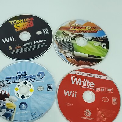 Nintendo Wii Games Lot of 4 Bundle Track Attack Tony Hawk Shaun White Smurfs 2 