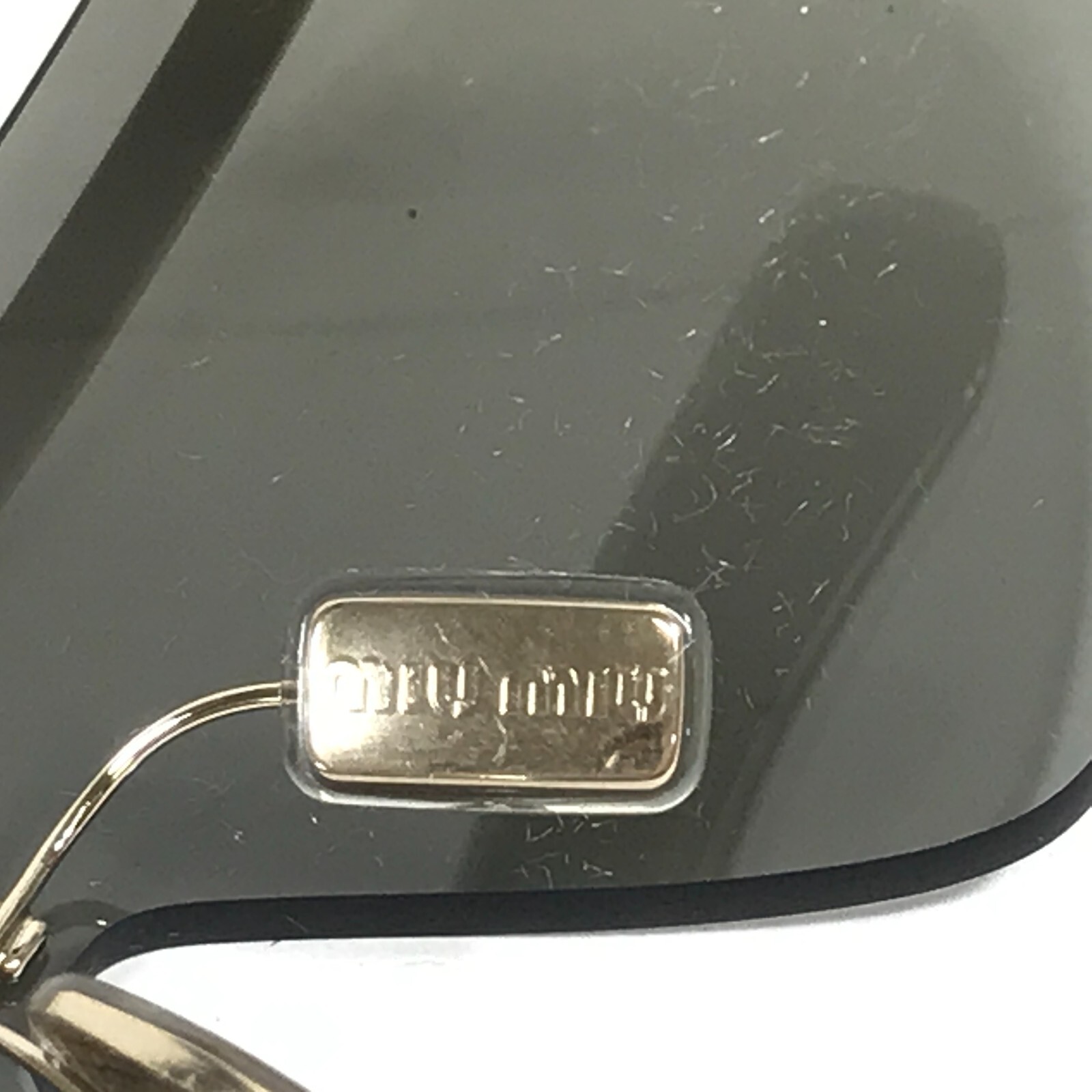 Pre-owned Miu Miu Sunglasses Smu50z Zvn-112 Pale Gold Frames With Light Grey Shield Lens In Gray
