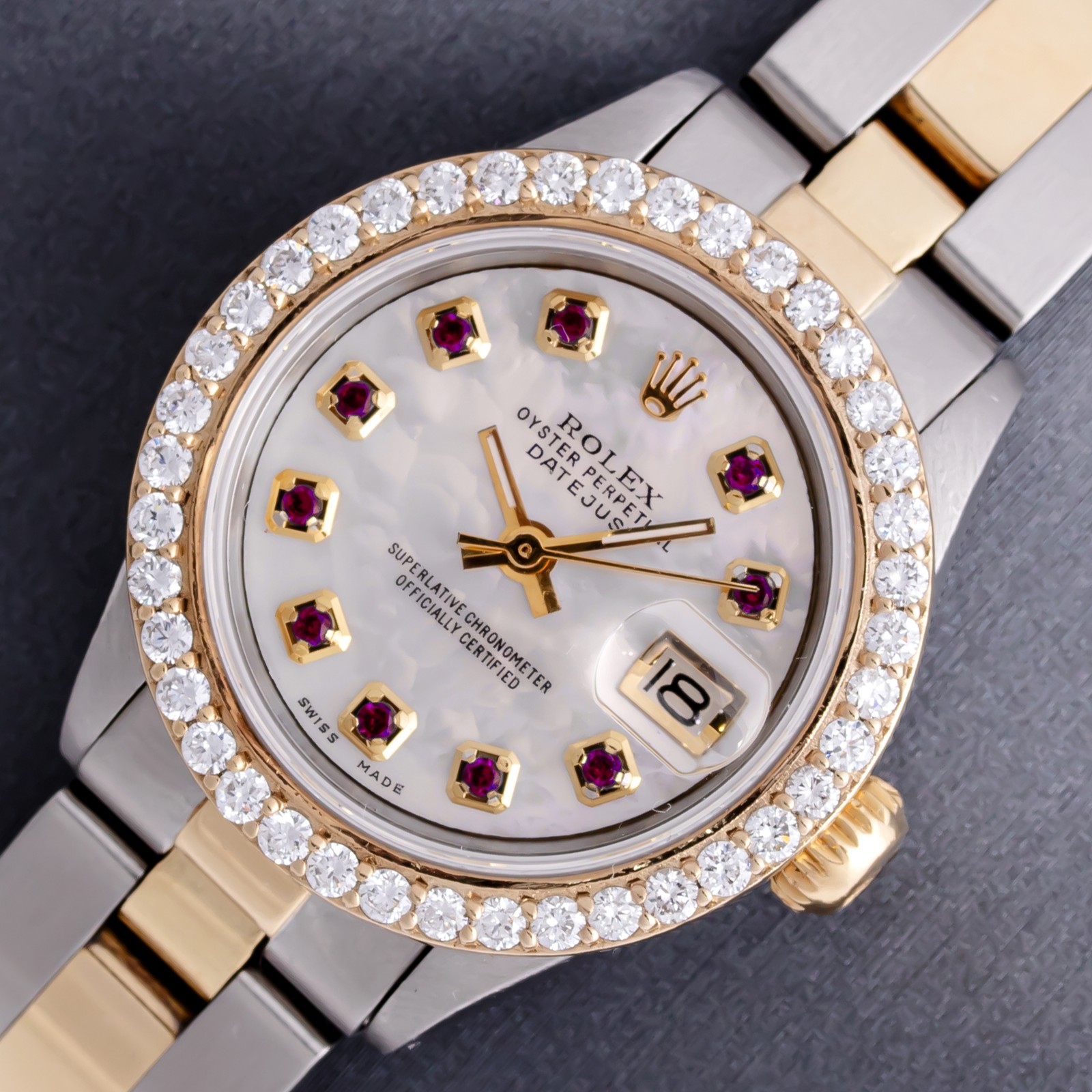 ROLEX LADIES STAINLESS STEEL DATEJUST RUBY DIAL AND DIAMOND BEZEL WATCH OYSTER