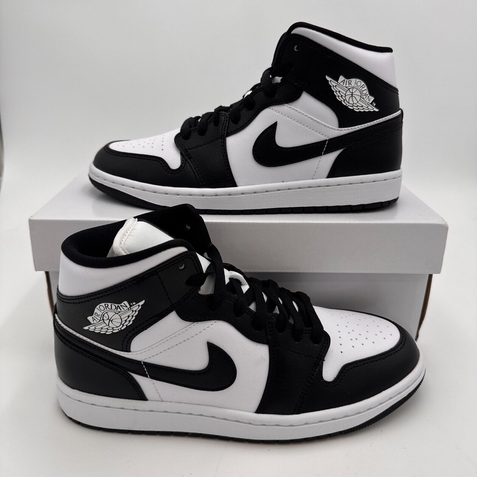 Size 8.5W Nike Air Jordan 1 Mid Black/White Panda Sneaker Size 8.5W Nike Air Jordan 1 Mid Black/White Panda Sneaker
