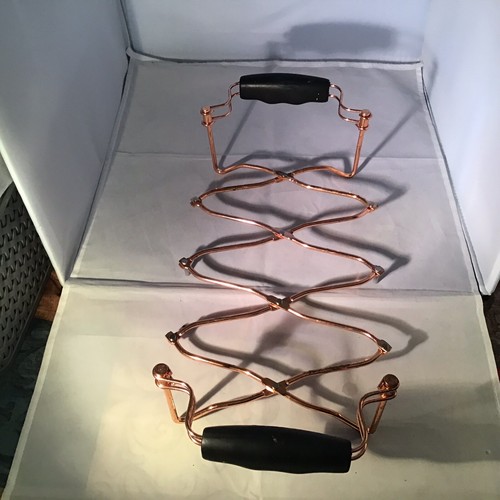 Revere Ware Copper Plated Expandable Trivet for Corning Casserole Dishes.