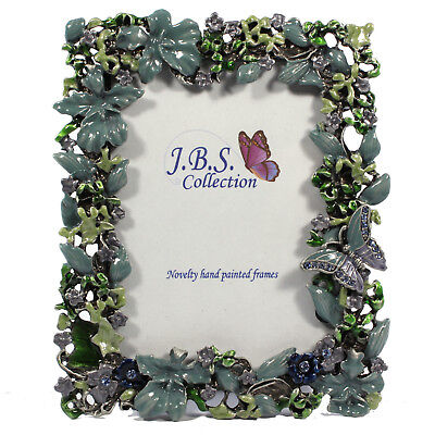 Bejeweled butterfly in garden photo frame, enamel painted with crystals