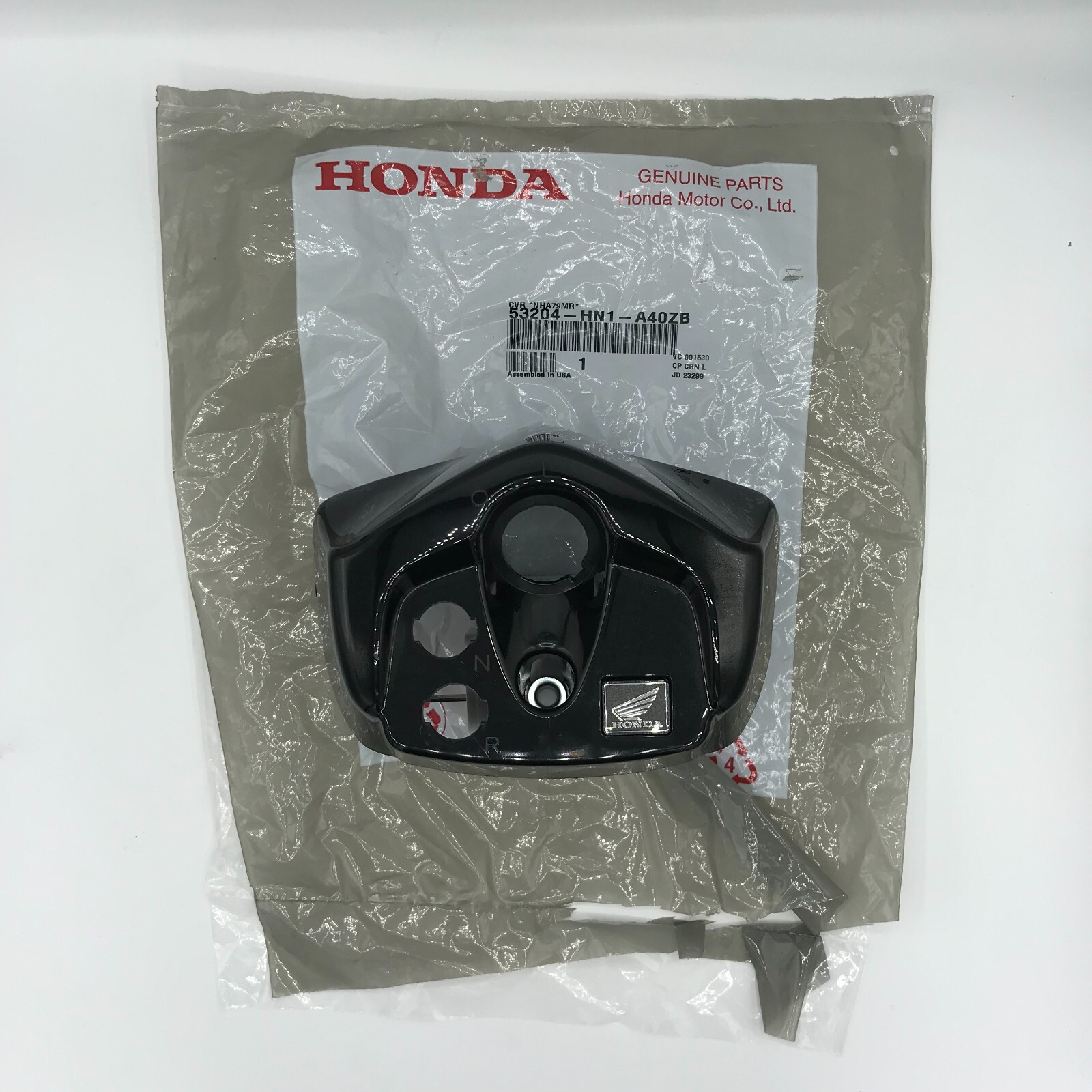 a Genuine OEM Honda Handlebar Dash Black Cover Key Holder