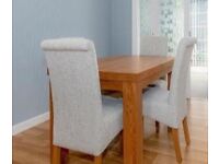 Oak dining table and chairs 