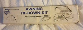 Awning tie down kit