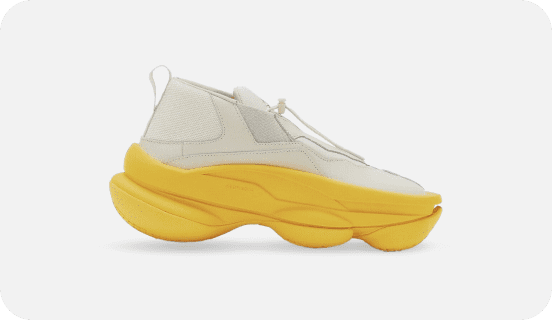A yellow and white sneaker linking to Pyer Moss shopping page