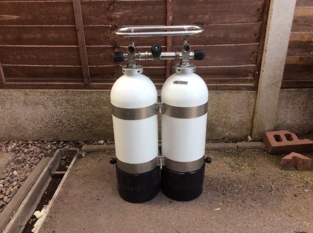 Twin 10 litre cylinders with Custom Divers halo, in test until April