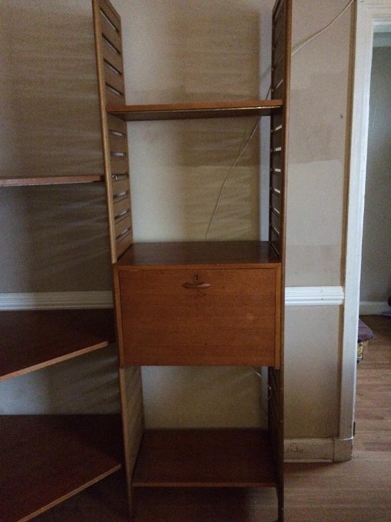 Staples ladderax corner shelving unit with tall bay and bureau in