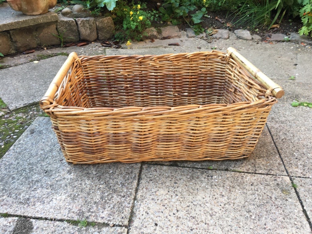 Large IKEA wicker storage baskets with wooden handles in Nottingham