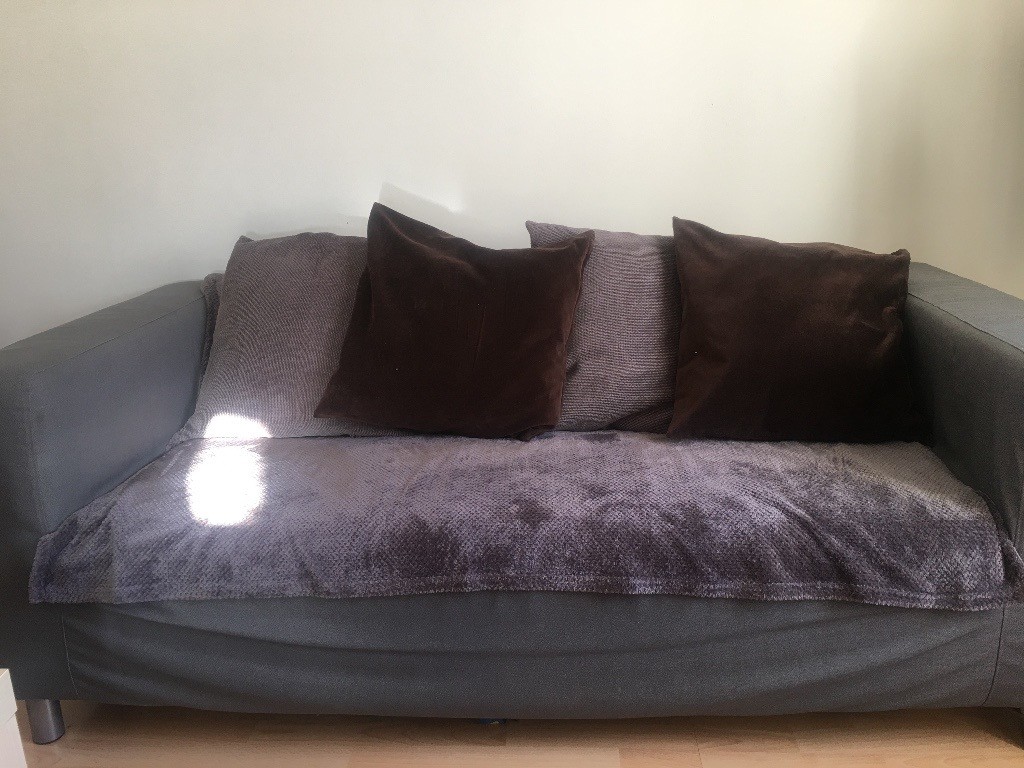 Reduced Three Seater IKEA Sofa With Cover Throw And Pillows