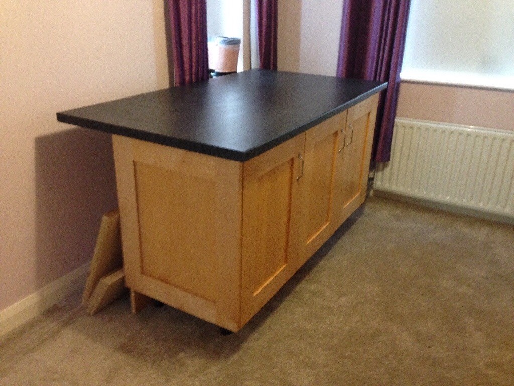 A solid beech wood kitchen. Units & island unit very sturdy. Already