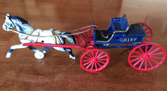 VINTAGE CAST IRON HORSE AND POLICE CHIEF CART WITH OPENING TRUNK