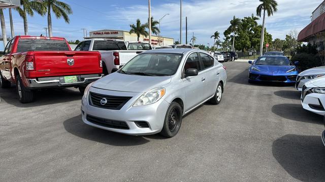 Silver Nissan Versa with 112500 Miles available now!