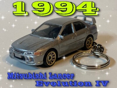 RARE KEY CHAIN MITSUBISHI EVOLUTION IV SILVER w/GOLD WHEELS CUSTOM