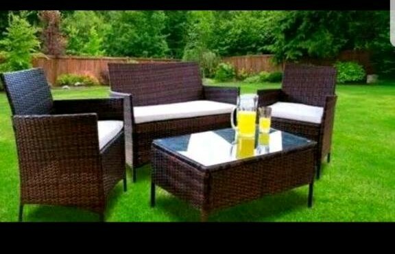 A brand new stylish brown 4 piece garden rattan furniture set . | in