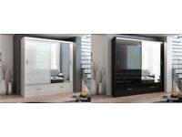 High Gloss Sliding Mirror Door Wardrobe in Black and White Color With Lot Of Space